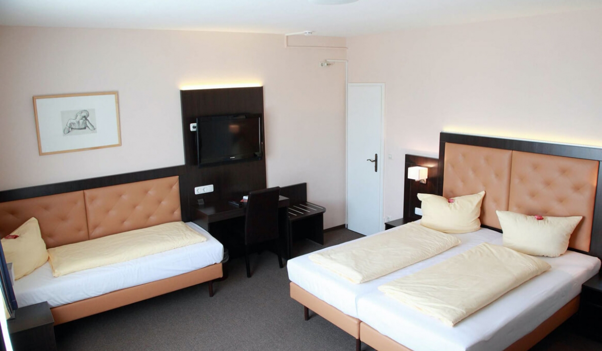 Dreibettzimmer